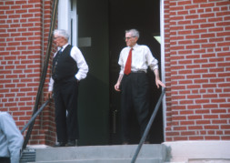 Actors exiting the courthouse from the trial scene.