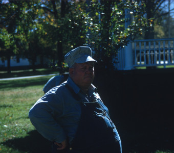 Production crewmember stands in front of the gazebo on courthouse lawn in Fort Scott, Kansas.