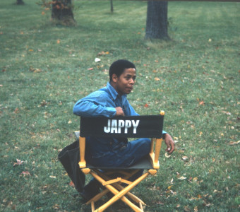 Actor Stephen Perry (Jappy) seated in his actor‚Äôs chair.