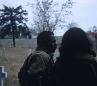 Director Gordon Parks and actress Carol Lamond (Big Mabel) standing in graveyard used for Sarah Winger funeral scene.