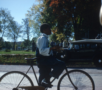 Actor riding a bike.