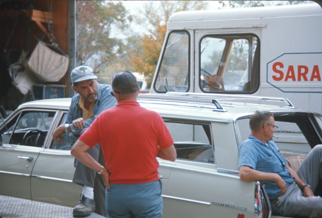 Crew members with production vehicles.