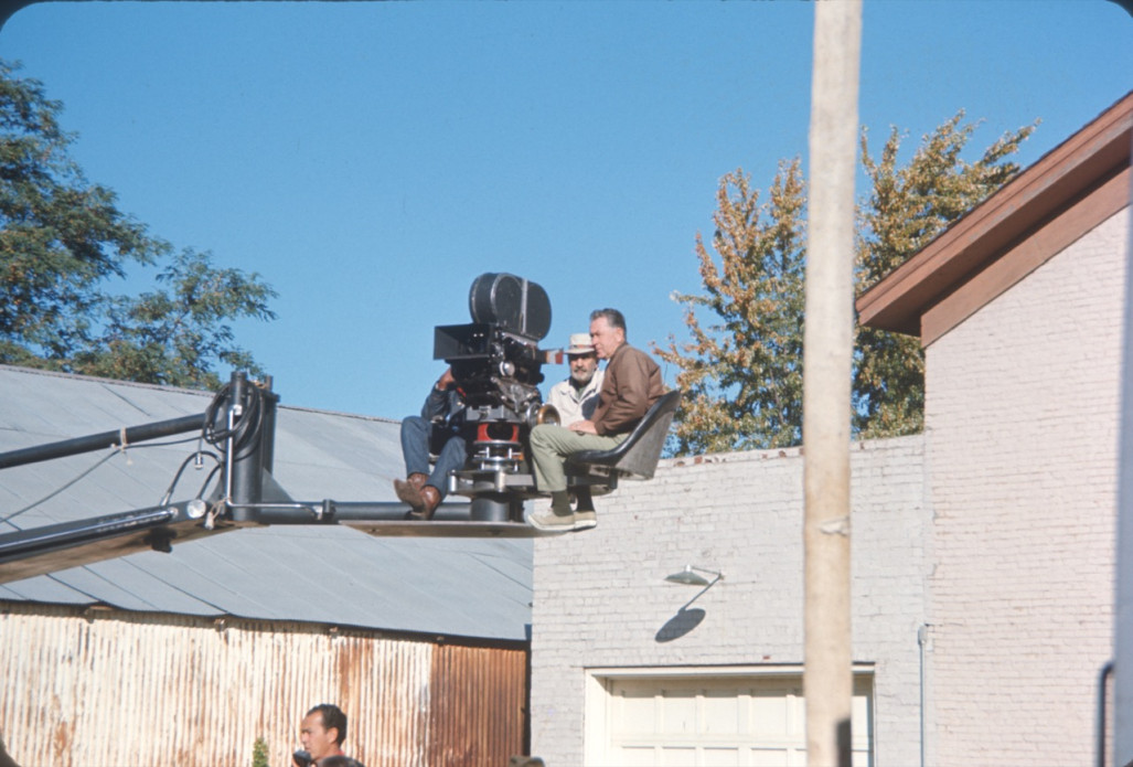 Production crew, including DIrector Gordon Parks (behind camera), filming from above in downtown Fort Scott, Kansas.