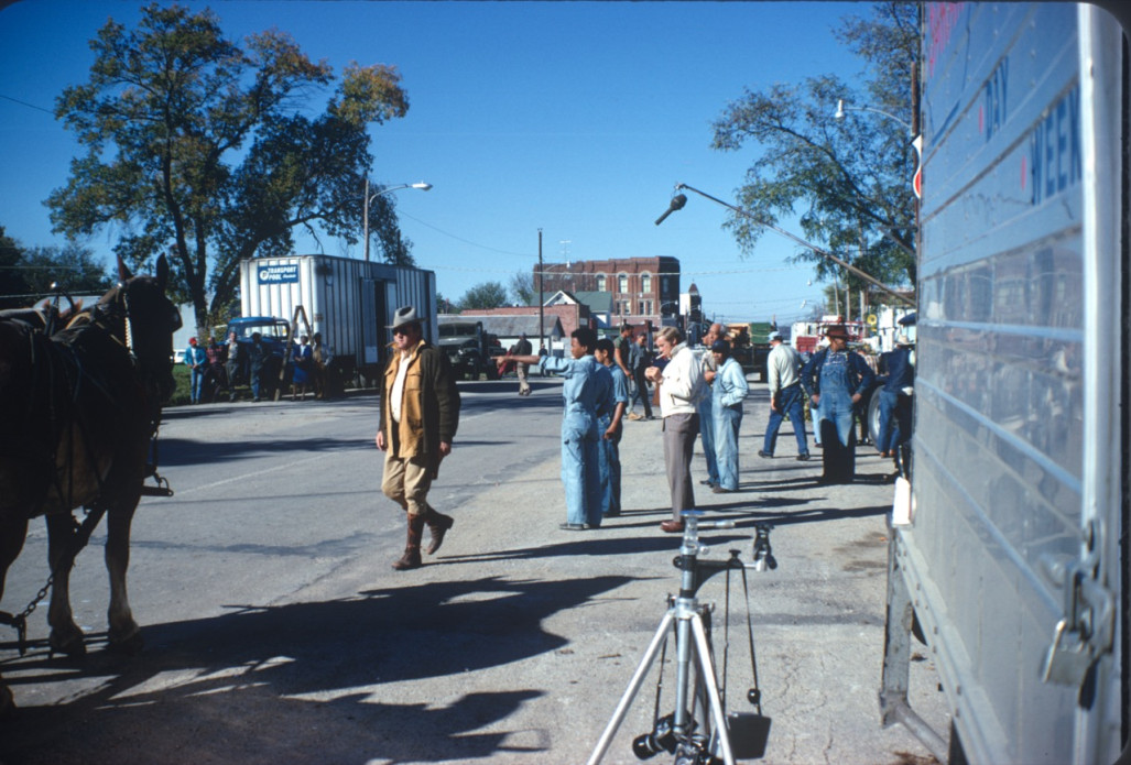 Actors Kyle Johnson, Dana Elcar, and others filming downtown Fort Scott, Kansas Actors Dana Elcar (Kirky) wearing a tan hat and Kyle Johnson (Newt Winger) in blue overalls, along with other actors and production crew in downtown Fort Scott, Kansas.