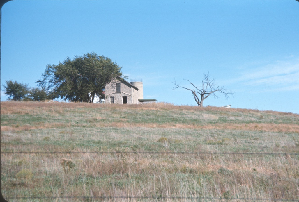 Photograph of the limestone slaughter house building from the tornado scene.