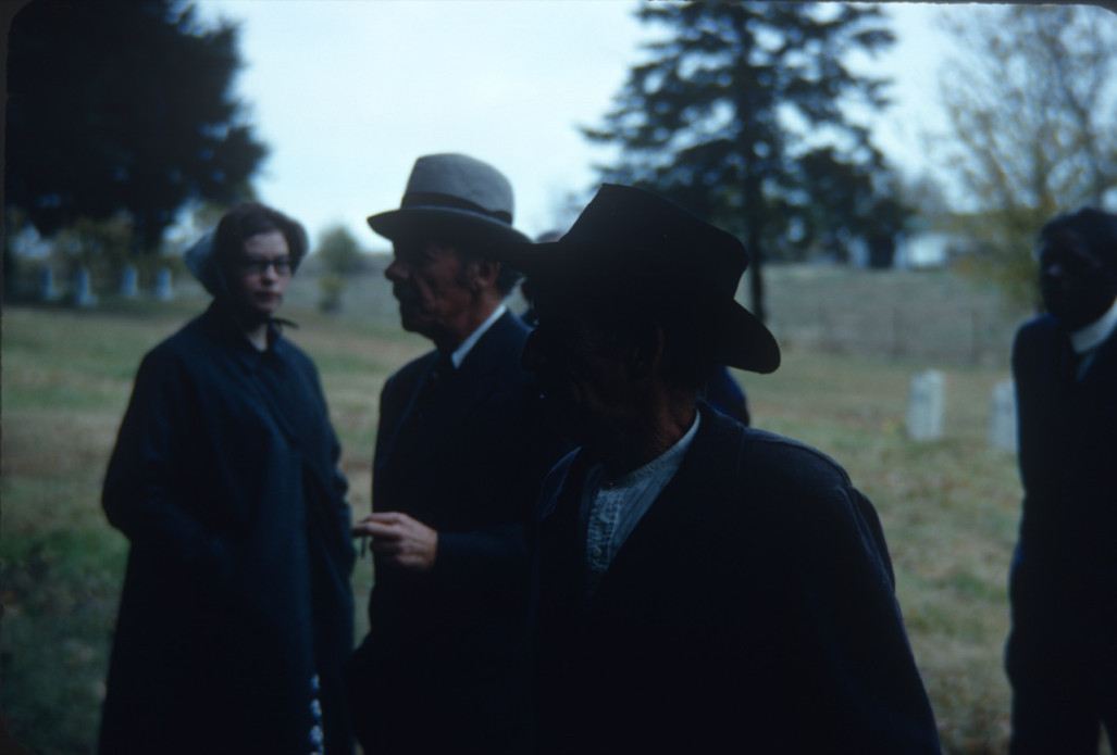 Actor Malcolm Atterbury (Silas Newhall), center, and fellow actors around filming of funeral scene.