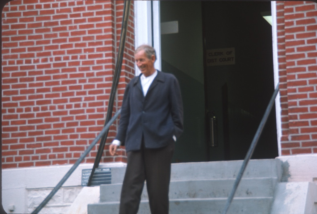 Actor Malcolm Atterbury (Silas Newhall) exiting courthouse building used in the trial scene.